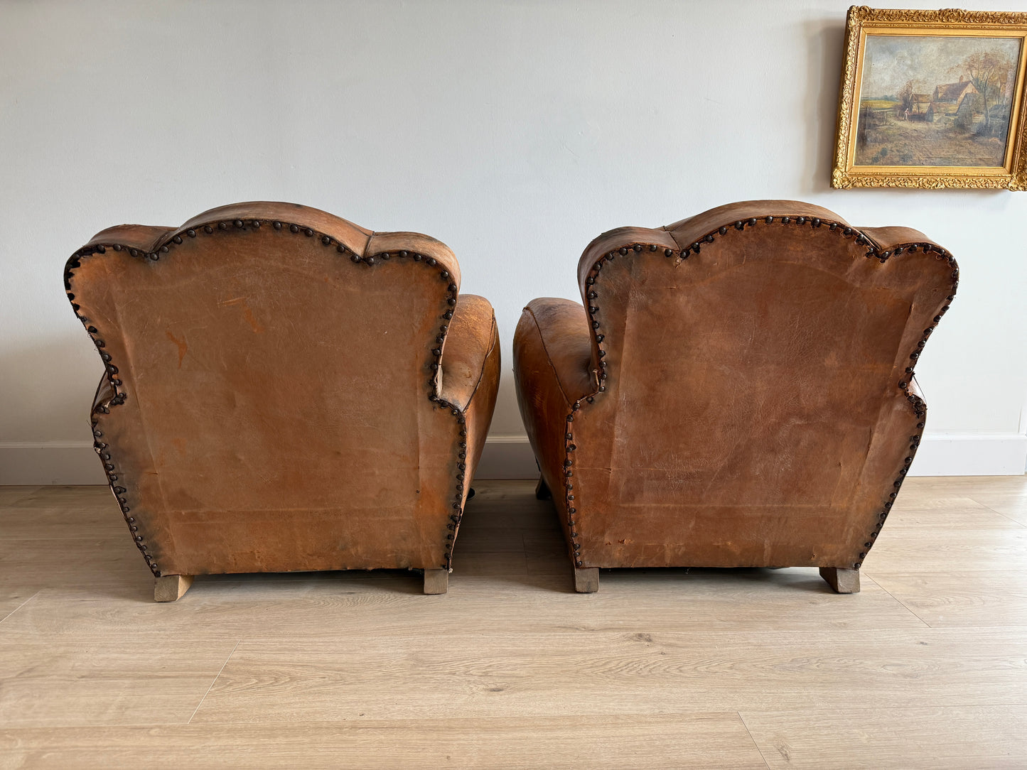 Pair of Antique French Leather Moustache Chairs (c.1920's)