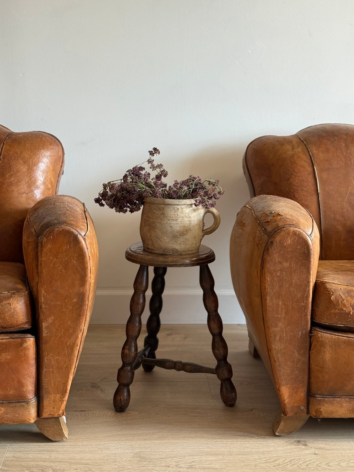 Pair of Antique French Leather Moustache Chairs (c.1920's)