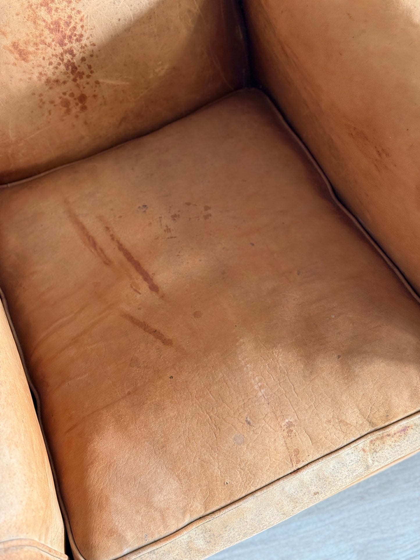 Antique Pair of French Leather Moustache Chairs